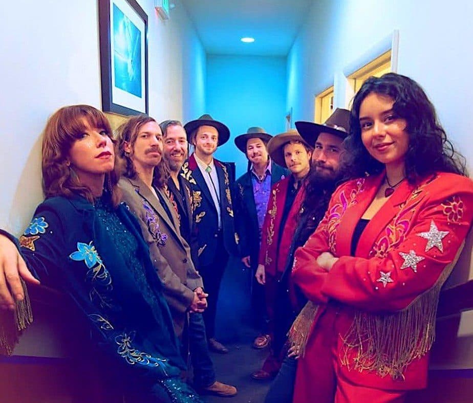 Boot juice band posing for a picture